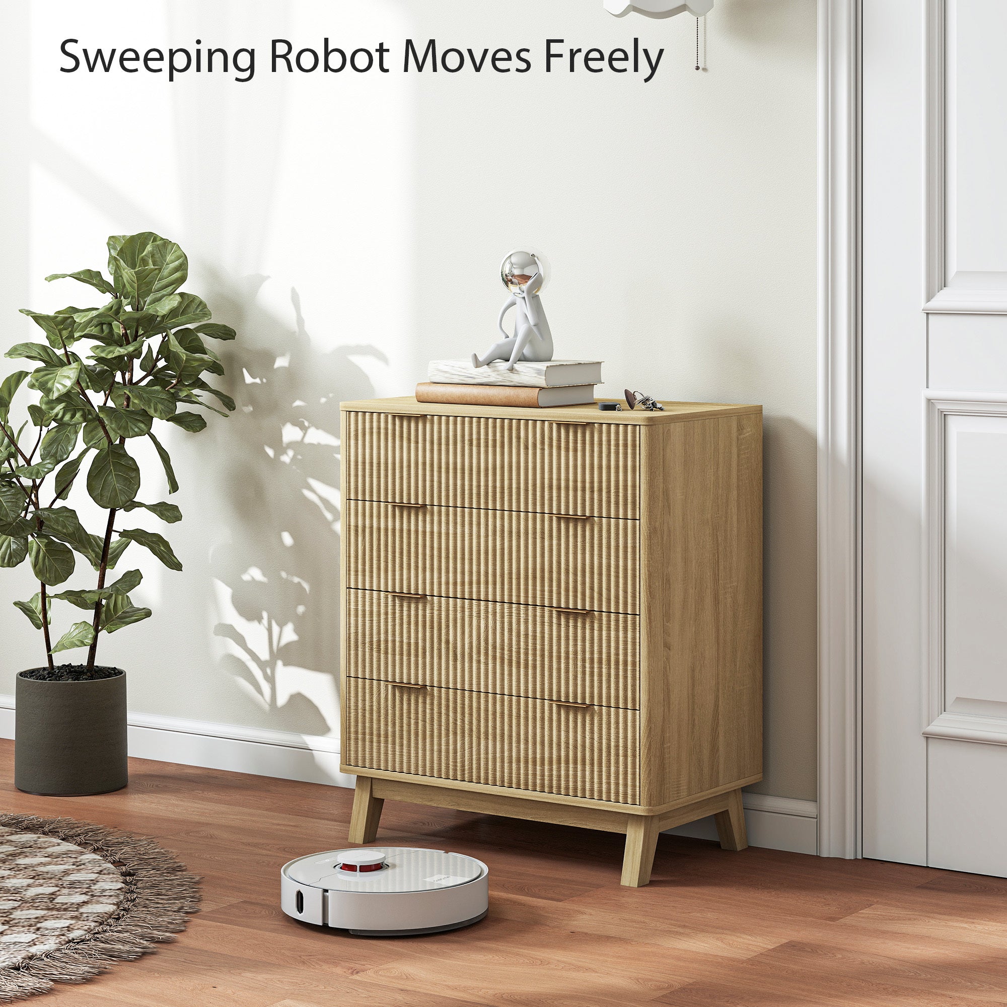 Robotic vacuum cleaner on a wooden floor next to a cabinet with a plant and decorative items.