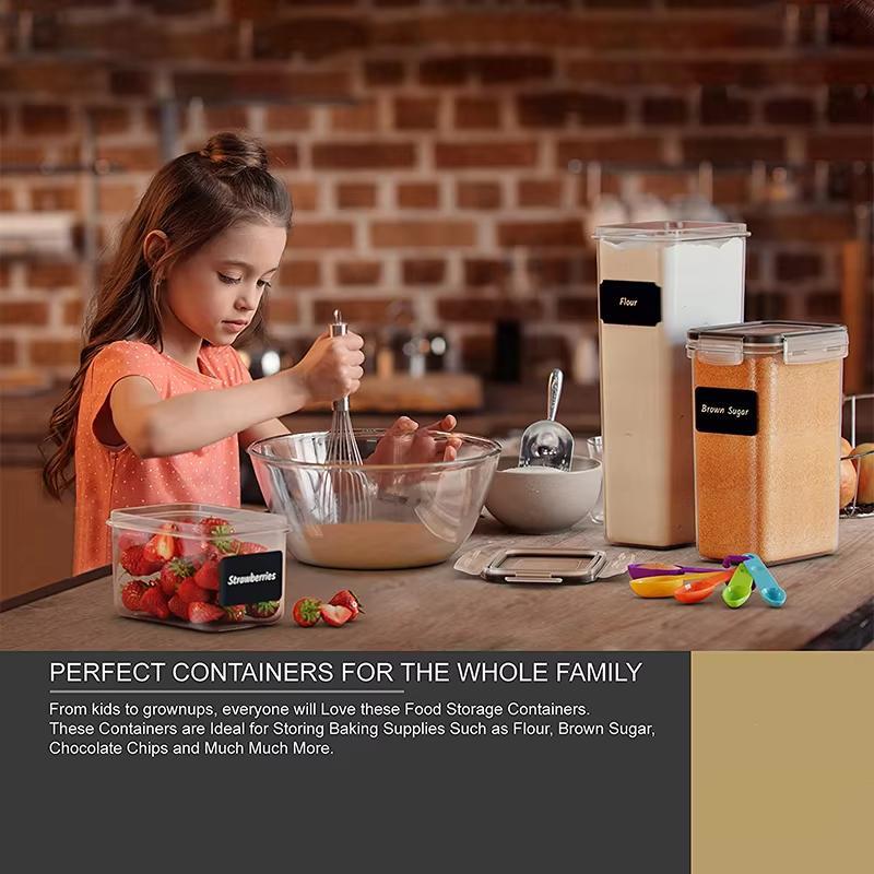 Child baking with food storage containers on a wooden table against a brick wall.