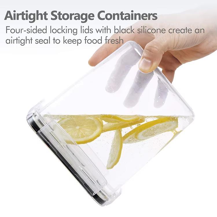 Airtight storage container with lemon slices inside, held by a hand wearing a white glove.