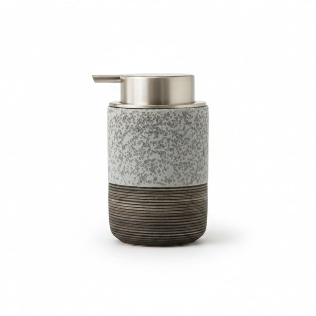A cylindrical soap dispenser with a speckled gray upper body, a brushed metallic silver pump, and a dark ribbed lower section, shown with dimension labels indicating 8 cm width and 13.5 cm height on a white background.