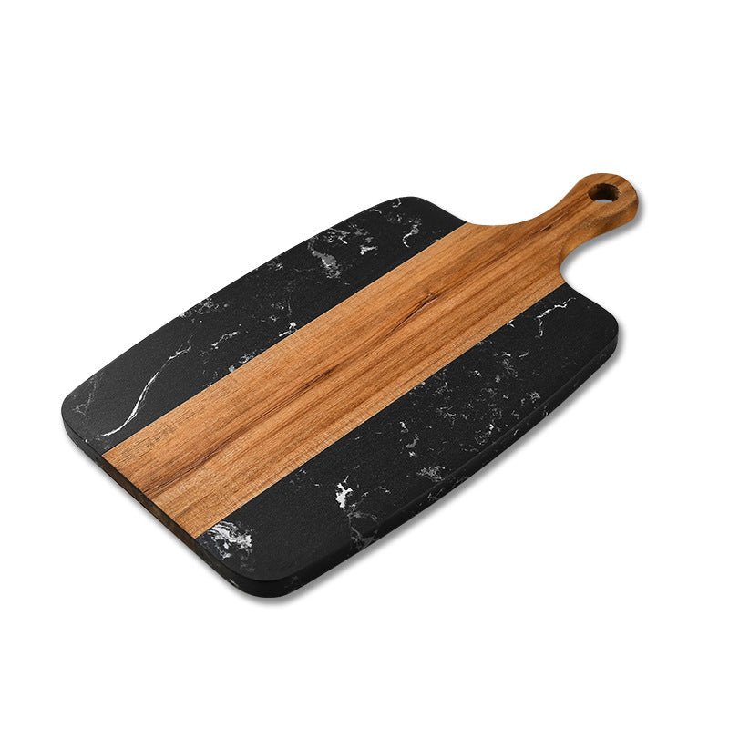 Black marble and wooden cutting board on a white background