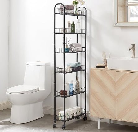 Bathroom with a black metal shelf against a white wall, next to a toilet and wooden vanity.