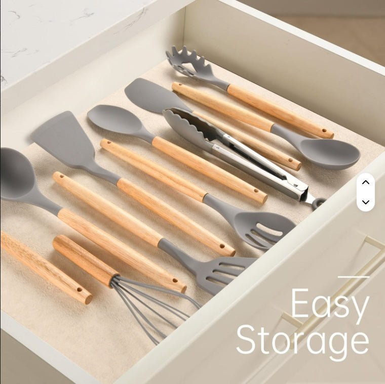 Set of kitchen utensils with wooden handles in a drawer labeled 'Easy Storage'.