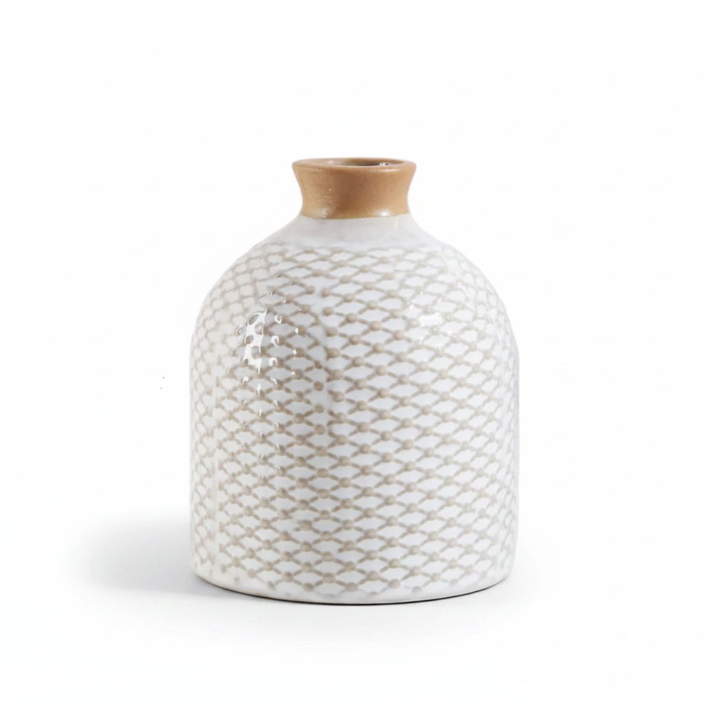 A small ceramic vase with a rounded body, a textured white and beige fish-scale pattern, and a natural light brown unglazed neck, shown on a white background.