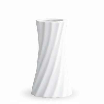 A white ceramic vase with a twisted, fluted design, shown on a light gray surface with text overlay detailing its dimensions.