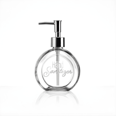 Clear hand sanitizer bottle with pump on a white background