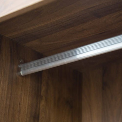 Metal handle on a wooden cabinet