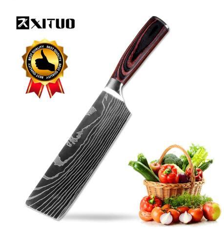 Chef knife with stainless steel blade and ergonomic handle next to a basket of fresh vegetables, showcasing the versatile kitchen tool.
