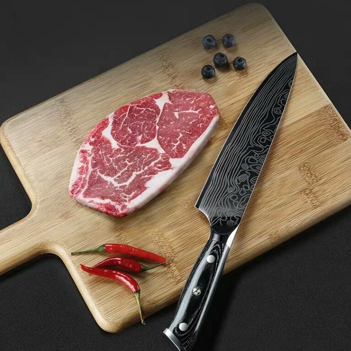 Multi-function kitchen knife with ergonomic handle on cutting board with steak, chili peppers, and blueberries.