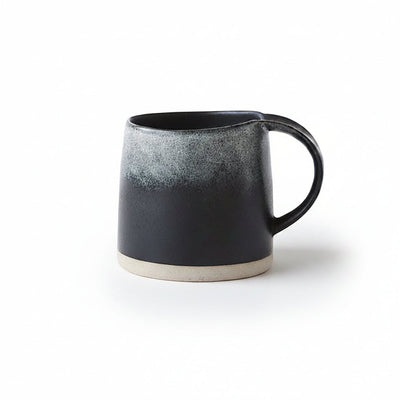 Black ceramic mug on a white background