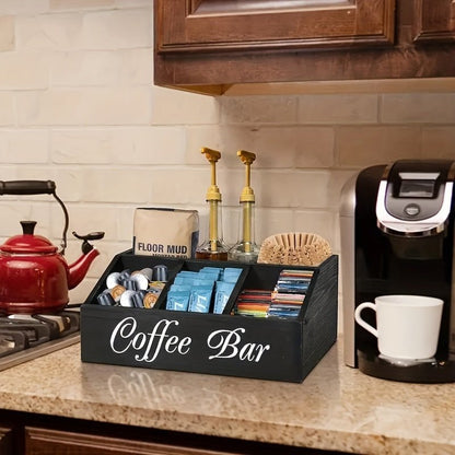 Coffee bar setup with a black organizer, coffee maker, and various coffee products on a kitchen counter.