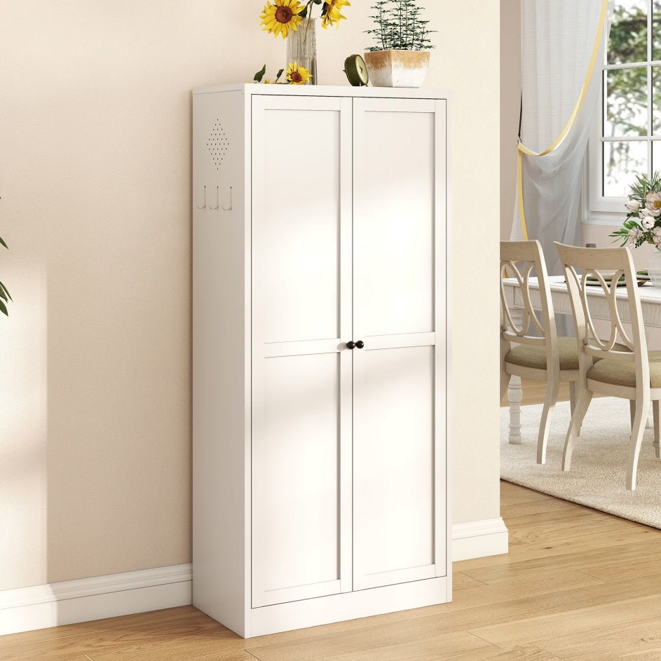 White storage cabinet in a room with a dining table and chairs.