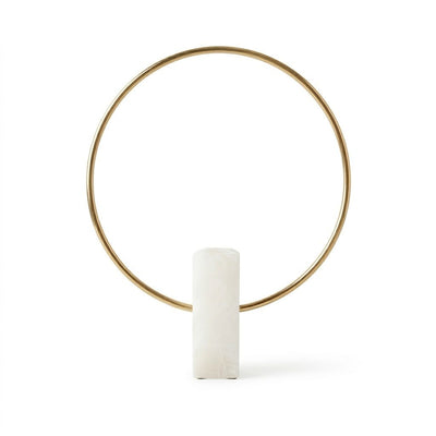 Gold circular frame with a white cylindrical object on a white background