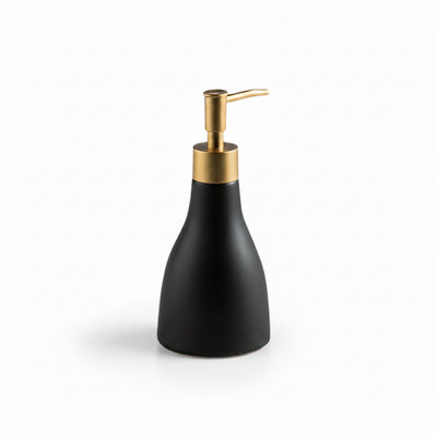 Black soap dispenser with gold pump on a white background