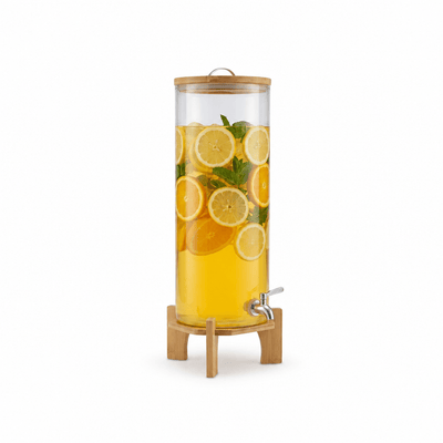 3.5-gallon glass beverage dispenser filled with lemonade and lemon slices on a wood stand
