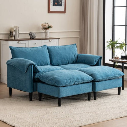 Blue sofa in a living room setting with decor elements.