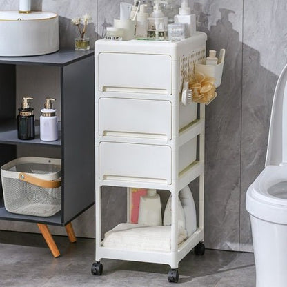 White rolling cart in a bathroom with various items on shelves