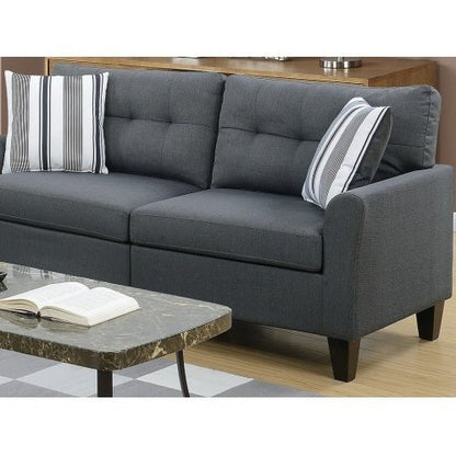 Gray sofa with striped cushions in a living room setting