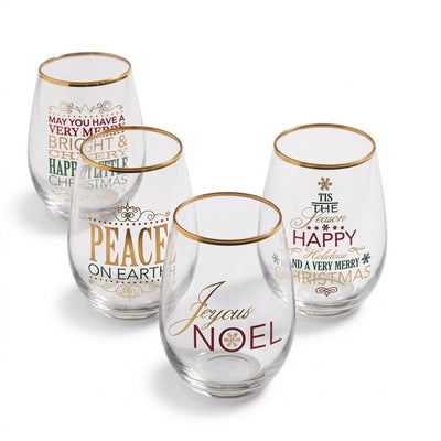 Four clear stemless wine glasses with gold rims, each printed with a different festive holiday message in red, green, and gold lettering, arranged on a white background.