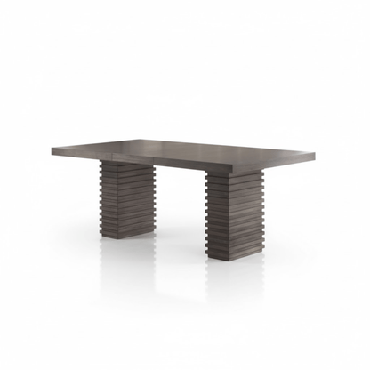 Modern dining table with unique rectangular base design on a white background