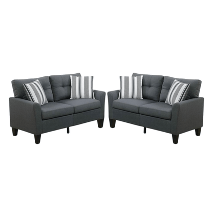 Gray sofa set with striped cushions on a white background