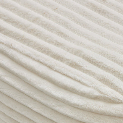Close-up of textured beige fabric with diagonal lines