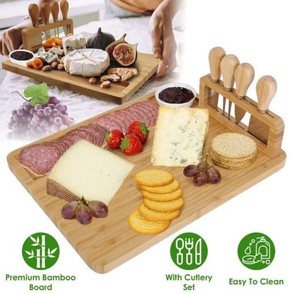 Wooden charcuterie board with meats, cheeses, fruits, and crackers on a white surface.