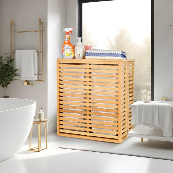 Bathroom with wooden cabinet, towels, and cleaning supplies