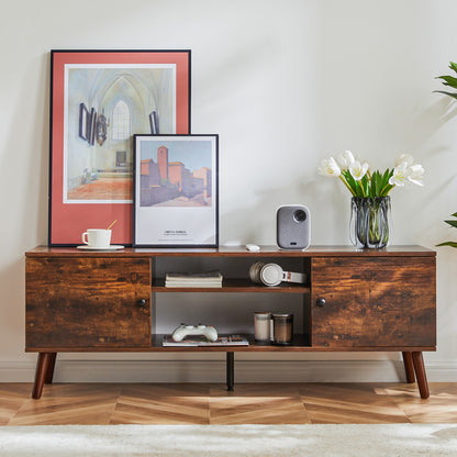 Wooden entertainment console with decorative items in a living room setting