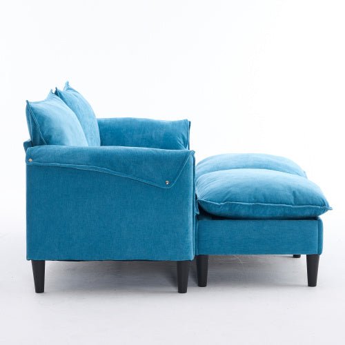 Blue sofa with cushions on a white background