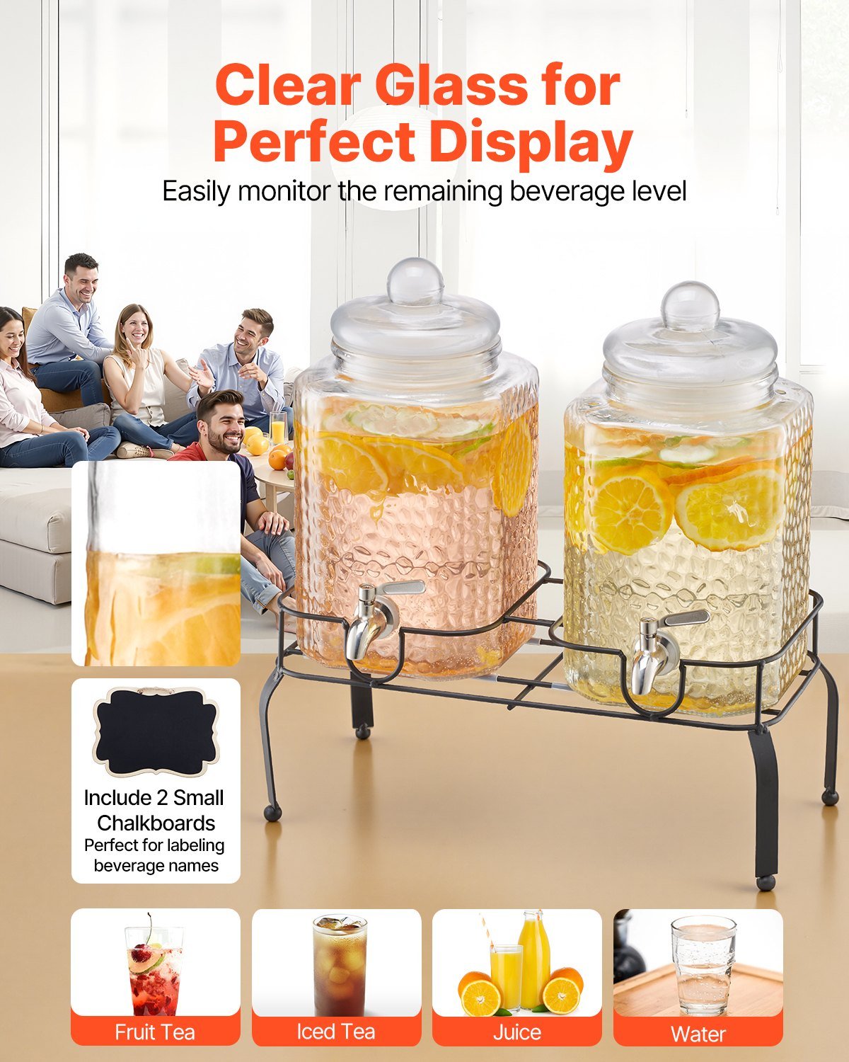Clear glass drink dispensers with a stand on a table, surrounded by people in a casual setting.