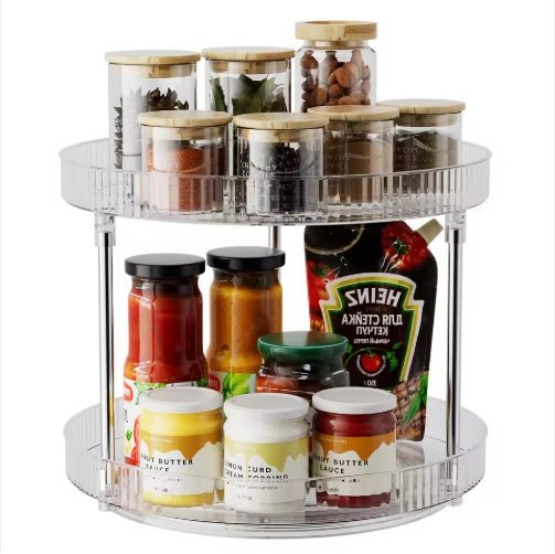 Two-tier spice rack with various jars and containers on a white background