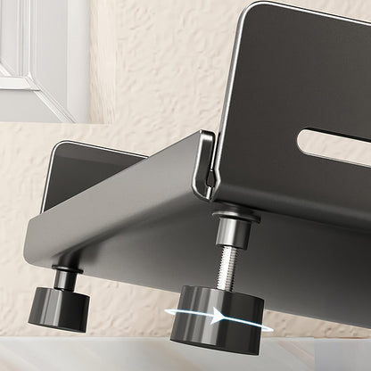 Close-up of a metallic faucet with a blurred background