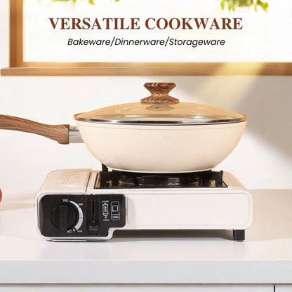White frying pan with wooden handle and lid on a portable electric stove, with 'VERSATILE COOKWARE' text above.