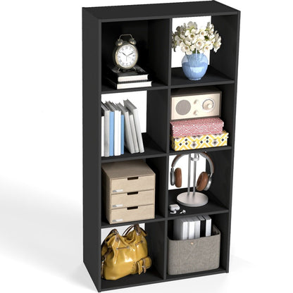 Black cube shelf with various items on a white background
