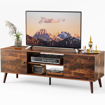 Wooden TV stand with a television displaying a mountain scene on a white background