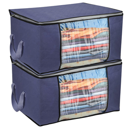 Blue storage bags with transparent windows showing folded clothes on a white background