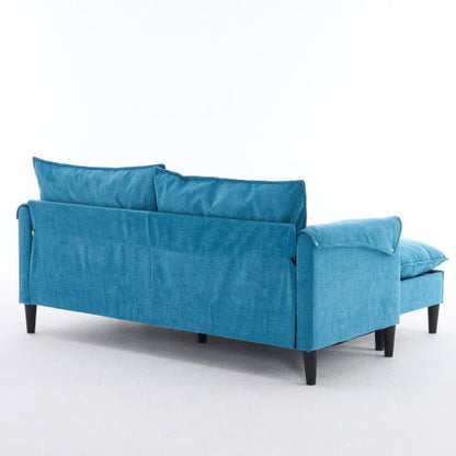 Blue sofa with cushions on a white background