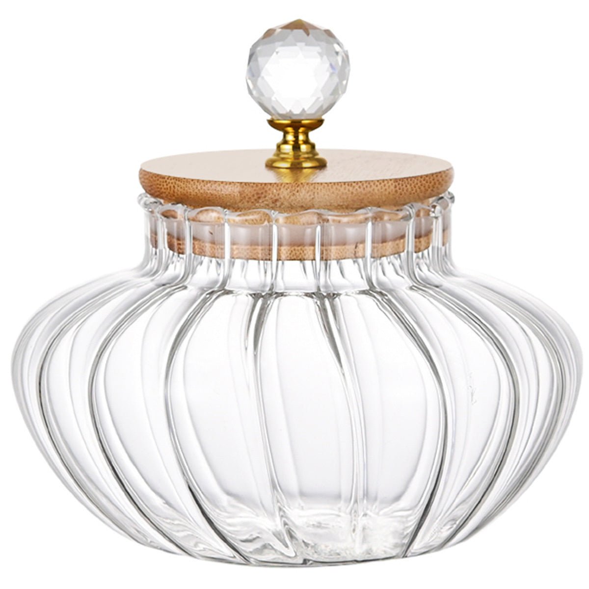 Clear glass jar with a wooden and crystal lid on a white background
