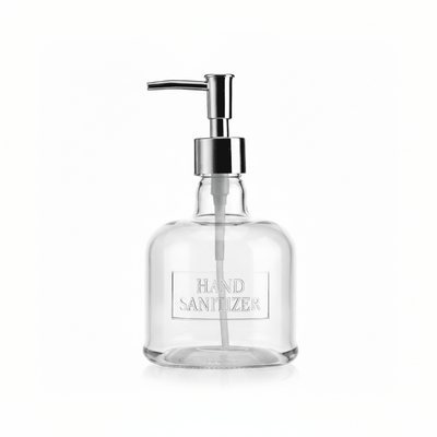 Clear hand sanitizer bottle with pump on a white background