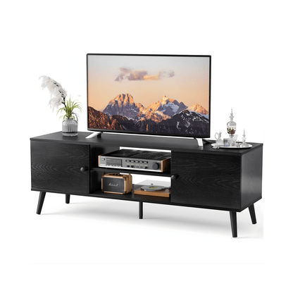Black TV stand with a television displaying a mountain scene on a white background